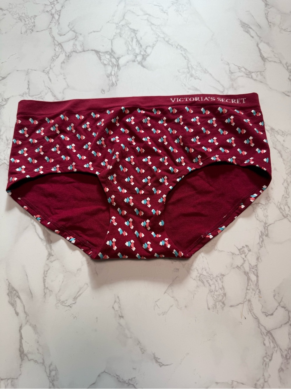 Victoria's Secret Maroon Hipster Panty with Multicolor Tiny Print. Size M.